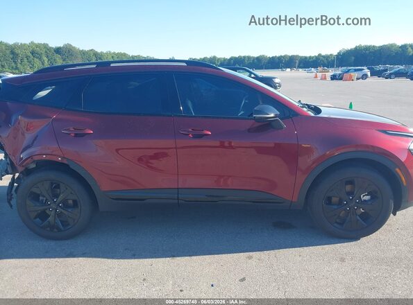 5XYK6CDF2SG258038 2025 KIA SPORTAGE Red Widok wnętrza z tyłu