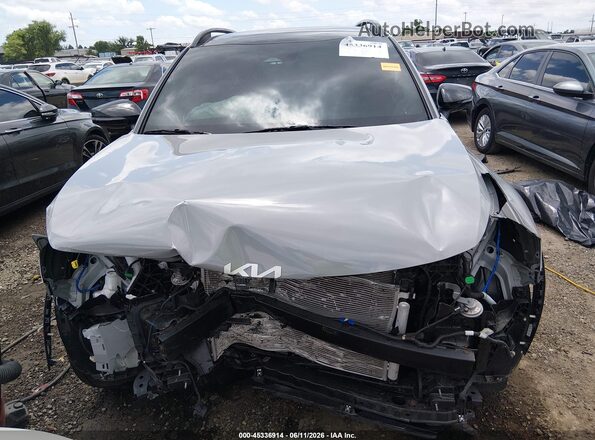 5XYK6CDF5RG221012 2024 KIA SPORTAGE Gray Սալոնի հետևի տեսք