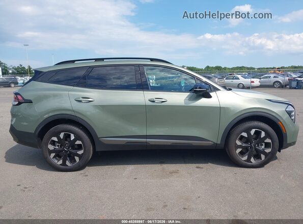 5XYK6CDF7RG225398 2024 KIA SPORTAGE Green Вид задньої частини салону