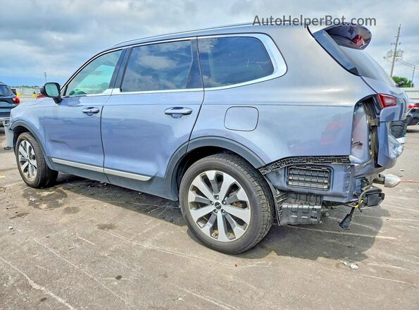 5XYP34HC2NG299553 2022 KIA TELLURIDE Blue Trasero izquierdo