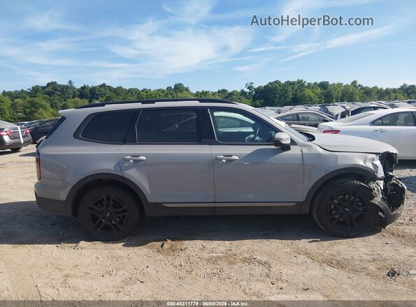 5XYP5DGC2PG375450 2023 KIA TELLURIDE Gray Widok wnętrza z tyłu