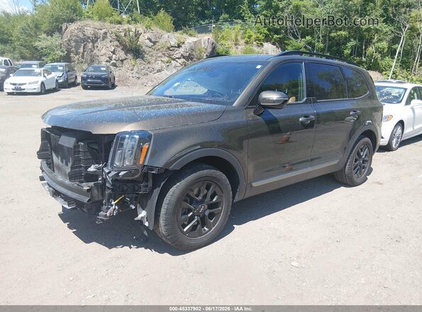 5XYP5DGC6PG388086 2023 KIA TELLURIDE Champagne Առջևի ձախ երեք քառորդ տեսարան