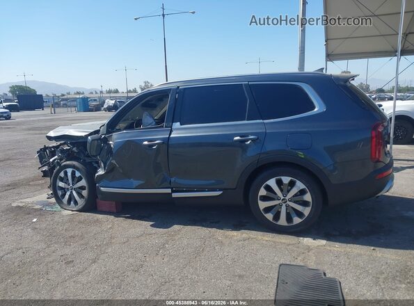 5XYP64HC0LG009735 2020 KIA TELLURIDE Gray Vista interior trasera
