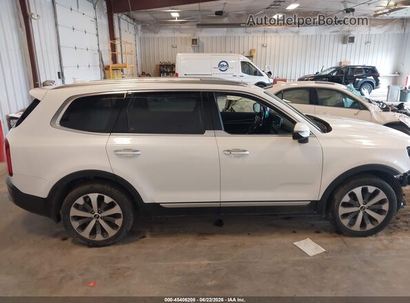 5XYP6DHC7LG033451 2020 KIA TELLURIDE White Widok wnętrza z tyłu