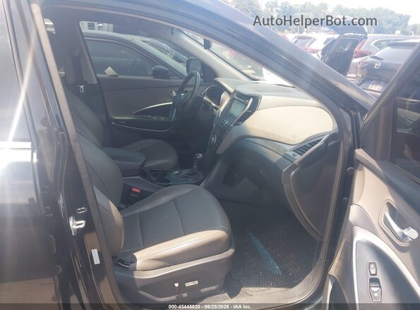 5XYZWDLA7GG320549 2016 HYUNDAI SANTA FE SPORT Black Front interior view