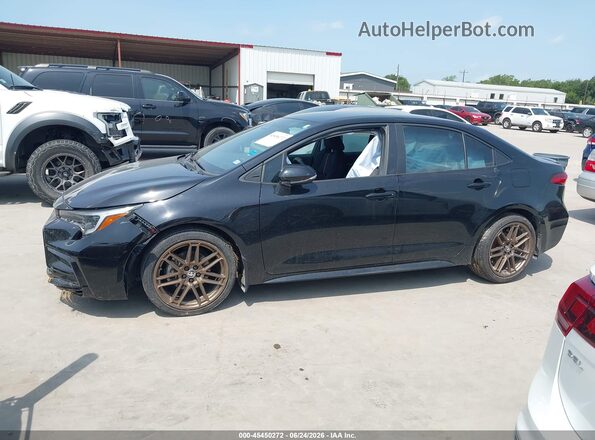 5YFB4MCE0RP203842 2024 TOYOTA COROLLA Black Սալոնի հետևի տեսք