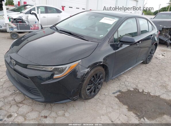 5YFB4MDE0PP015592 2023 TOYOTA COROLLA Black Vista tres cuartos delantera izquierda