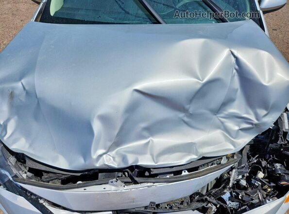 5YFB4MDE0SP248056 2025 TOYOTA COROLLA Silver Rear interior view
