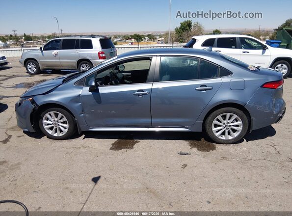 5YFB4MDE2SP310170 2025 TOYOTA COROLLA Blue Սալոնի հետևի տեսք