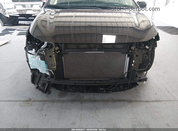 5YFB4MDE5SP264298 2025 TOYOTA COROLLA Black Вид задньої частини салону
