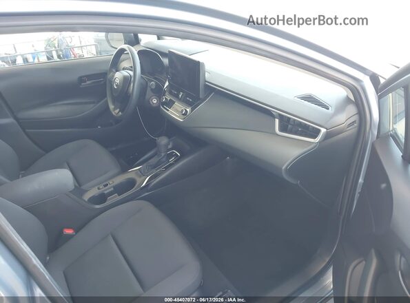 5YFB4MDE8PP075409 2023 TOYOTA COROLLA Light Blue წინა სალონის ხედი