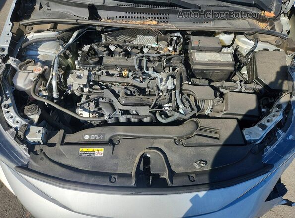 5YFB4MDEXSP253250 2025 TOYOTA COROLLA Silver Սալոնի հետևի տեսք