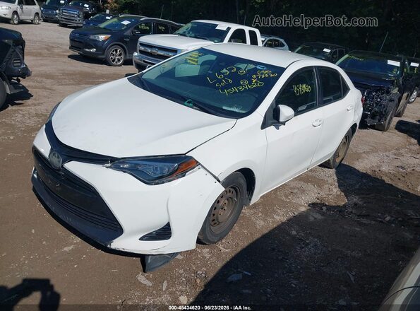 5YFBURHE0KP866159 2019 TOYOTA COROLLA White Przód lewy