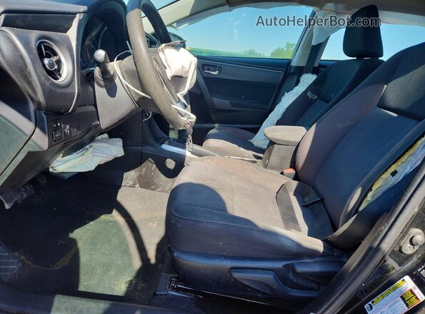 5YFBURHE0KP906286 2019 TOYOTA COROLLA Черный Вид салона спереди