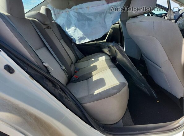 5YFBURHE0KP908975 2019 TOYOTA COROLLA White 