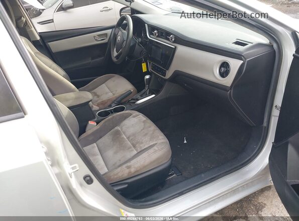 5YFBURHE0KP924660 2019 TOYOTA COROLLA Silver წინა სალონის ხედი