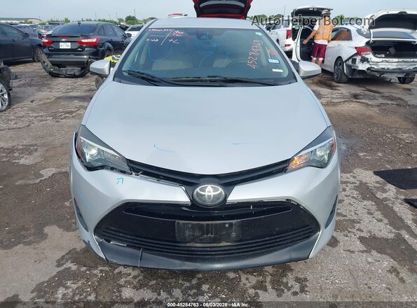 5YFBURHE0KP924660 2019 TOYOTA COROLLA Silver ხელსაწყოთა პანელის ხედი