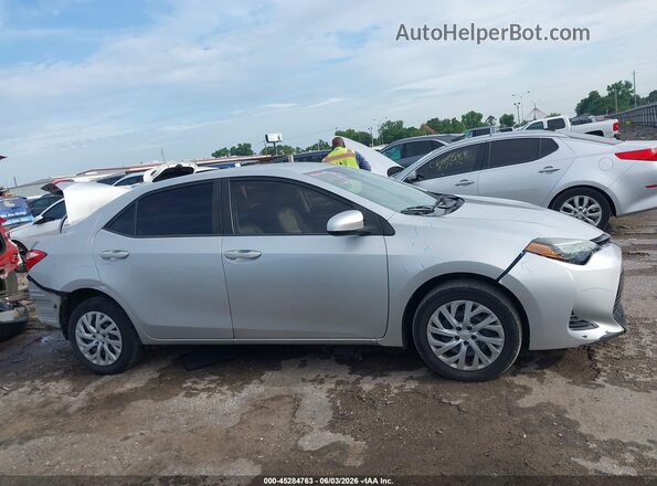 5YFBURHE0KP924660 2019 TOYOTA COROLLA Silver უკანა სალონის ხედი