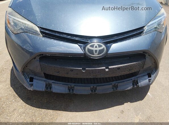 5YFBURHE1HP572228 2017 TOYOTA COROLLA Gray წინა ხედი