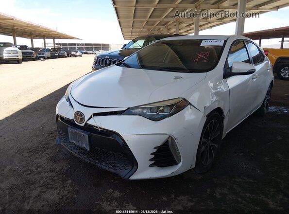 5YFBURHE1JP757630 2018 TOYOTA COROLLA White 