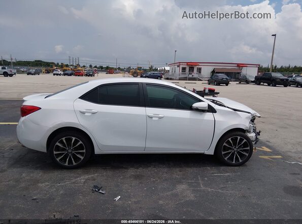 5YFBURHE1JP784388 2018 TOYOTA COROLLA White Սալոնի 360 աստիճան տեսք