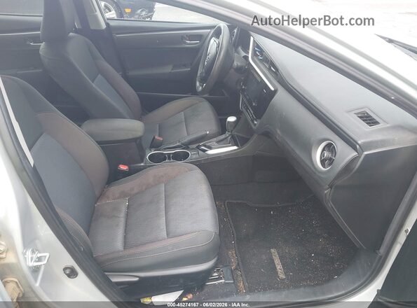 5YFBURHE2HP577650 2017 TOYOTA COROLLA Silver Front interior view