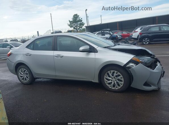 5YFBURHE2HP577650 2017 TOYOTA COROLLA Silver Rear interior view