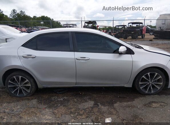 5YFBURHE2HP613692 2017 TOYOTA COROLLA Silver Rear interior view