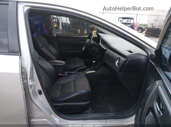 5YFBURHE2HP613692 2017 TOYOTA COROLLA Silver Front interior view