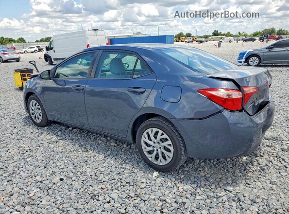 5YFBURHE2KP858127 2019 TOYOTA COROLLA Gray 
