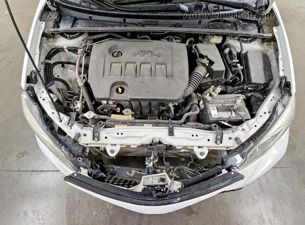 5YFBURHE2KP906709 2019 TOYOTA COROLLA Белый Вид задней части салона