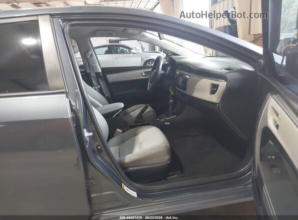 5YFBURHE3GP444331 2016 TOYOTA COROLLA Gray წინა სალონის ხედი