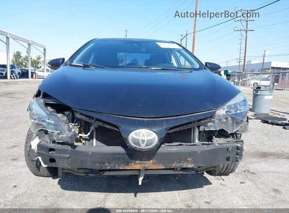 5YFBURHE3HP675960 2017 TOYOTA COROLLA Black Widok wnętrza z tyłu