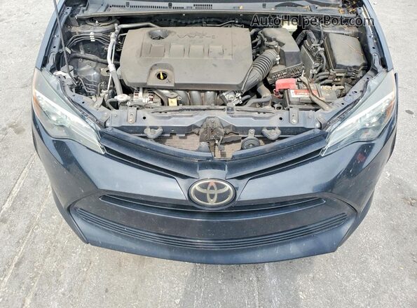 5YFBURHE3JP836216 2018 TOYOTA COROLLA Black Սալոնի հետևի տեսք