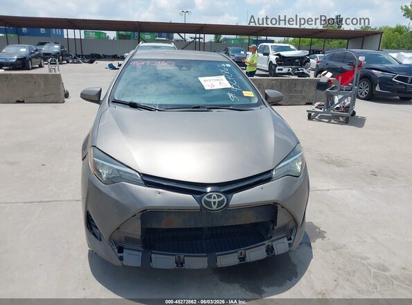 5YFBURHE4HP599648 2017 TOYOTA COROLLA Brown 