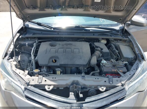5YFBURHE4HP599648 2017 TOYOTA COROLLA Brown Вид ззаду