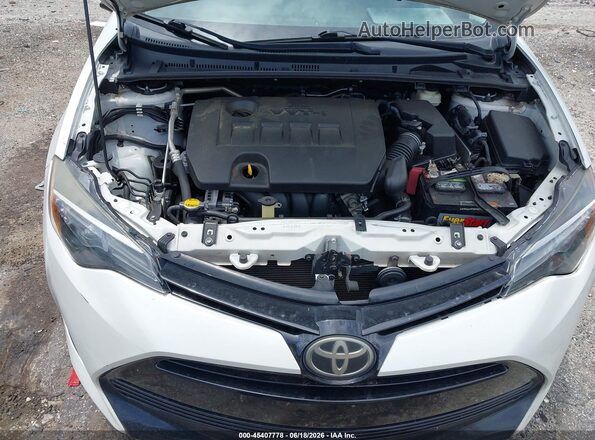5YFBURHE4HP635516 2017 TOYOTA COROLLA White Вид ззаду