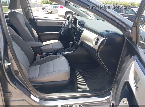 5YFBURHE4HP650601 2017 TOYOTA COROLLA Gray Widok wnętrza z przodu