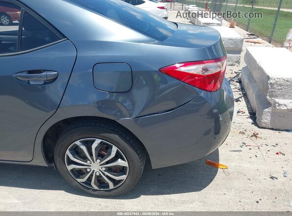 5YFBURHE4HP650601 2017 TOYOTA COROLLA Gray Widok z przodu