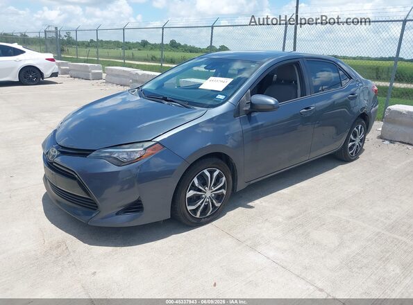 5YFBURHE4HP650601 2017 TOYOTA COROLLA Gray Przód lewy