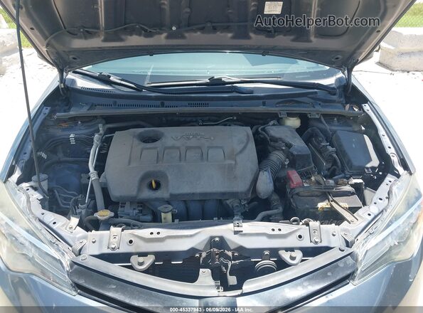 5YFBURHE4HP650601 2017 TOYOTA COROLLA Gray Widok z tyłu