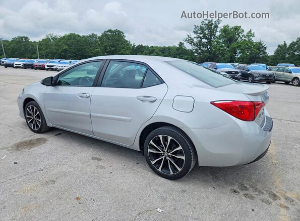 5YFBURHE4HP677944 2017 TOYOTA COROLLA Silver 
