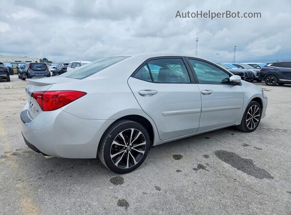 5YFBURHE4HP677944 2017 TOYOTA COROLLA Silver 