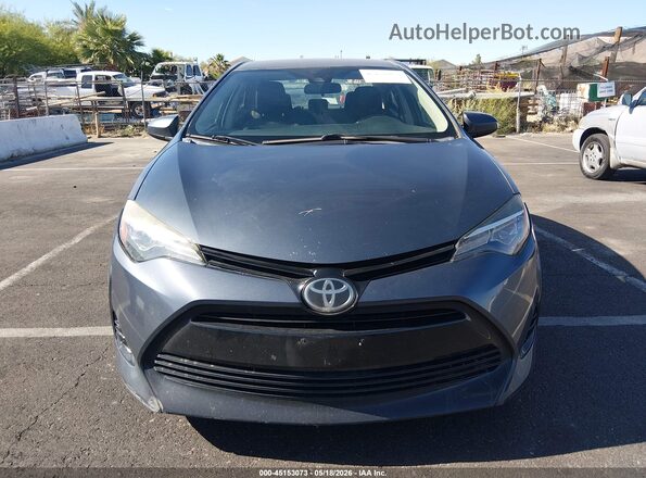5YFBURHE4HP707105 2017 TOYOTA COROLLA Gray 