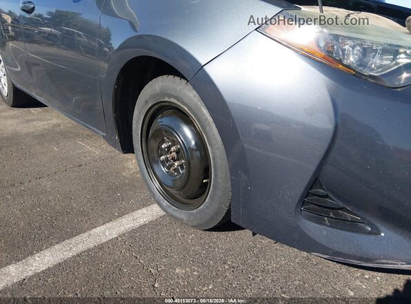 5YFBURHE4HP707105 2017 TOYOTA COROLLA Gray 