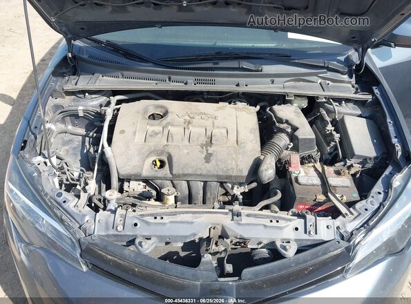 5YFBURHE4HP718041 2017 TOYOTA COROLLA Gray Vista trasera