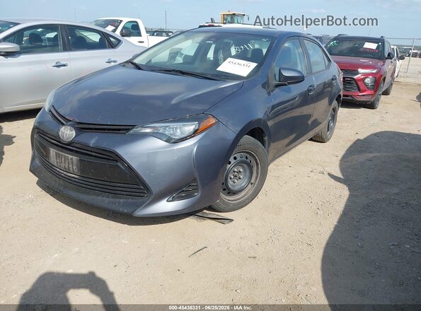 5YFBURHE4HP718041 2017 TOYOTA COROLLA Gray Vista tres cuartos delantera izquierda