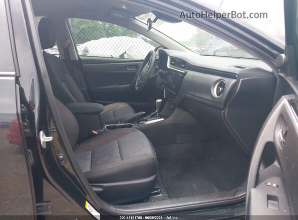 5YFBURHE4JP839089 2018 TOYOTA COROLLA Black Front interior view