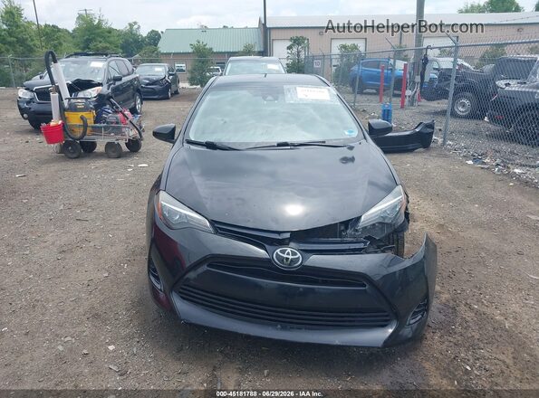 5YFBURHE4JP839089 2018 TOYOTA COROLLA Black Rear interior view