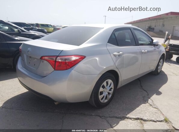 5YFBURHE4KP868691 2019 TOYOTA COROLLA Gray Trasero derecho